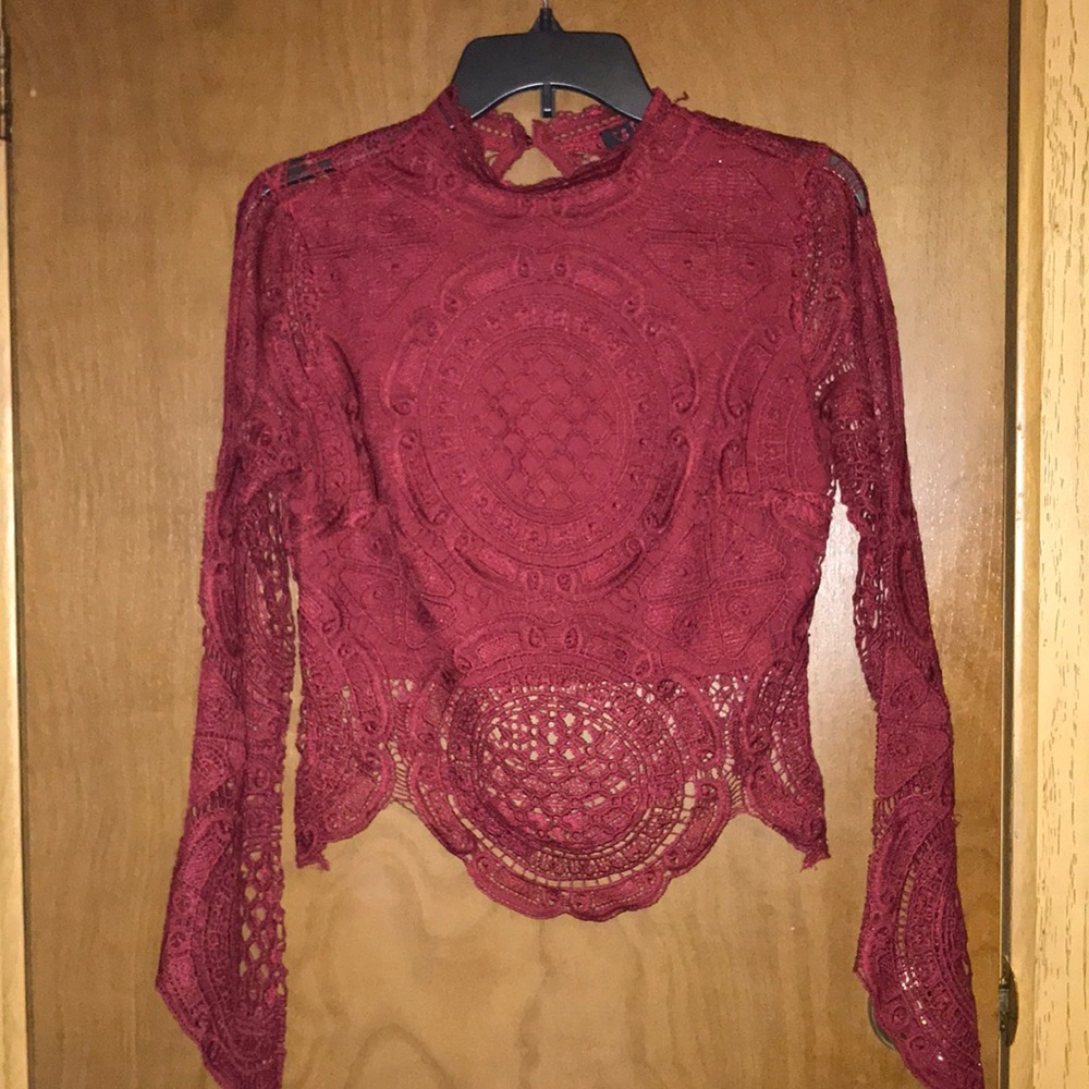 Burgundy lace crop top with a see through back